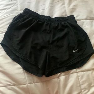 Black Nike running shorts